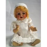 Simon and Halbig German bisque head doll with flirty eyes. Head numbered 126.