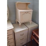 A pair of cream and gilt 3 drawer bedside cabinets and 1 other cabinet