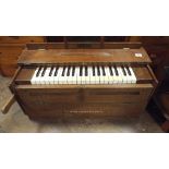 A French pump organ in oak case