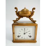 An early 19th century striking carriage clock by Aubert & Klaptnberger circa 1820 151/2cms high