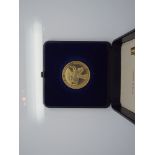 9ct gold Conquest of Everest commemorative coin 4.