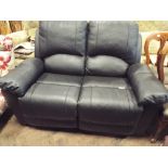 A small faux black leather 2 seater settee