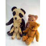 Collection of four English vintage teddy bears with jointed arms and legs,