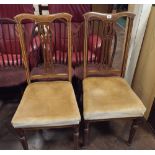 Pair of Edwardian mahogany dining chairs with gold upholstered seats