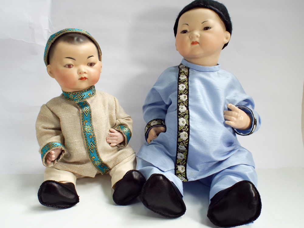 Two Chinese style modern bisque head jointed dressed dolls,