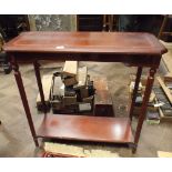 An inlaid 2 tier mahogany hall table