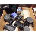 Assorted telephoto and other camera lenses, reflector lamp, flashlights etc.