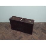 A 1930's vintage brown leather suitcase