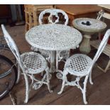 White metal Victorian style garden table and chairs