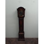 A good quality 1930's oak Grandmother clock in a barley twist case with an arch brass dial