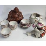 Collection of Oriental items to include a seated bronze Buddha, model of a monkey,