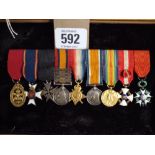 A miniature group of 9 medals comprising The order of the Bath sash badge in 18ct gold,