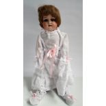 German bisque head fabric bodied doll.