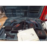 A Bosch cordless drill with charger and a Bosch 24 volt hammer drill with charger and spare battery