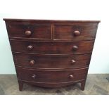 19th century mahogany bow fronted chest of 2 short and 3 long graduated drawers with bun handles