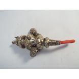 Victorian silver childs whistle rattle with coral handle