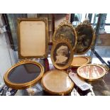 Collection of brass framed and ribbon decorated photograph frames