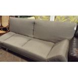 Modern click clack bed settee sofa upholstered in a charcoal fabric