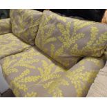 Pair of modern easy chairs in green patterned covering - matching electric chair previous