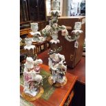 Meissen style candleabra and a figure candlestick ,