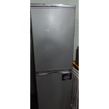 Hotpoint half and half fridge freezer in silver case