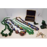 Rectangular black and gilt enamel trinket box,Vintage millefiore glass and other bead necklaces,