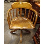 Swivel tub shaped oak office elbow chair