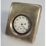 Hallmarked silver Edwardian pocket watch holder and a plated pocket watch within,