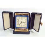 A Jaeger le Coultre Art Deco travelling clock in blue square case and fitted travelling case,