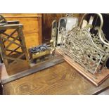 Victorian pierced brass magazine rack and a coal miner ornament