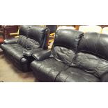 Pair of sectional 2 seater settees in black leather,