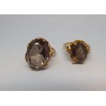 Two 9ct yellow gold set smoky quartz dress rings,