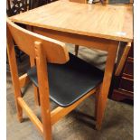 3'6 woodgrain formica top drop leaf kitchen table and a pair of matching chairs