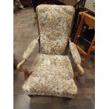 Late Victorian mahogany framed elbow chair in figured tapestry