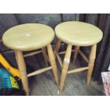 2 light wood stools