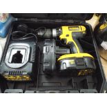 A DeWalt 18v cordless drill with charger and spare battery