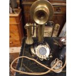 Brass stick style old telephone