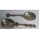 Pair of 19th century hallmarked silver ornate spoons, possibly wedding spoons,