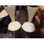 Set of four 1960s black and cream vinyl upholstered dining chairs