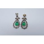 Pair of antique emerald diamond and seed pearl earrings set in white gold with tear drop shaped