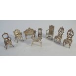 Collection of miniature hallmarked silver furniture, comprising sofas, chairs,