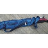 Qty of fishing rods in large carry bag etc.