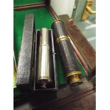 Slide rule style calculator and a small leather cut and brass telescope