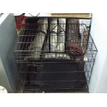 Black metal folding dog cage