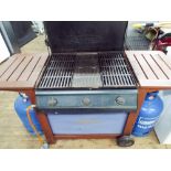 Outback trolley gas garden barbecue with 2 cylinders and a large overhead waterproof canopy