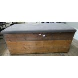 Large wooden trunk with material top