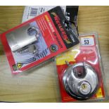 Three large heavy duty security padlocks