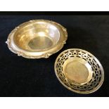 Small circular pierced silver bonbon dish and a larger silver dish, gross weight of pair 3.