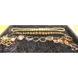 A collection of jewellery to include bracelet, necklace, earrings, brooch,