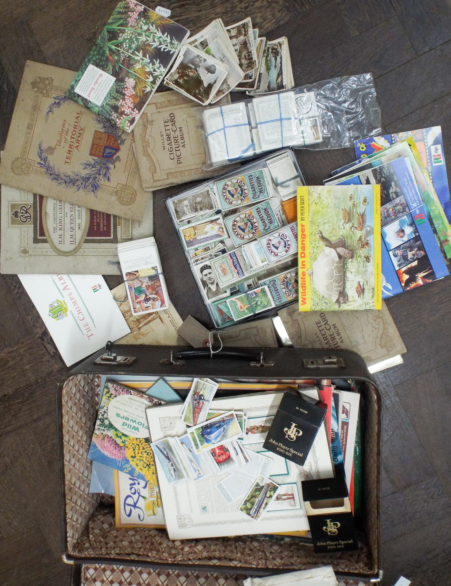 Old suitcase full of cigarette cards, tea cards in albums and loose, to include British birds,